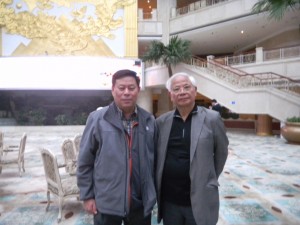 周子秋會長與全球崇正總會秘書長王長江(左)合影