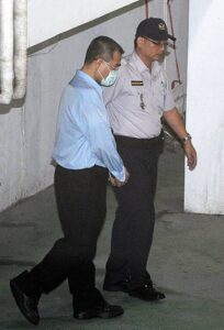 手錠をかけられ台北拘置所に移送される林氏(写真提供:中央社) 手錠をかけられ台北拘置所に移送される林氏(写真提供:中央社)