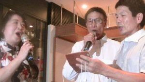 榮光會長何道台與幹部合唱我愛中華