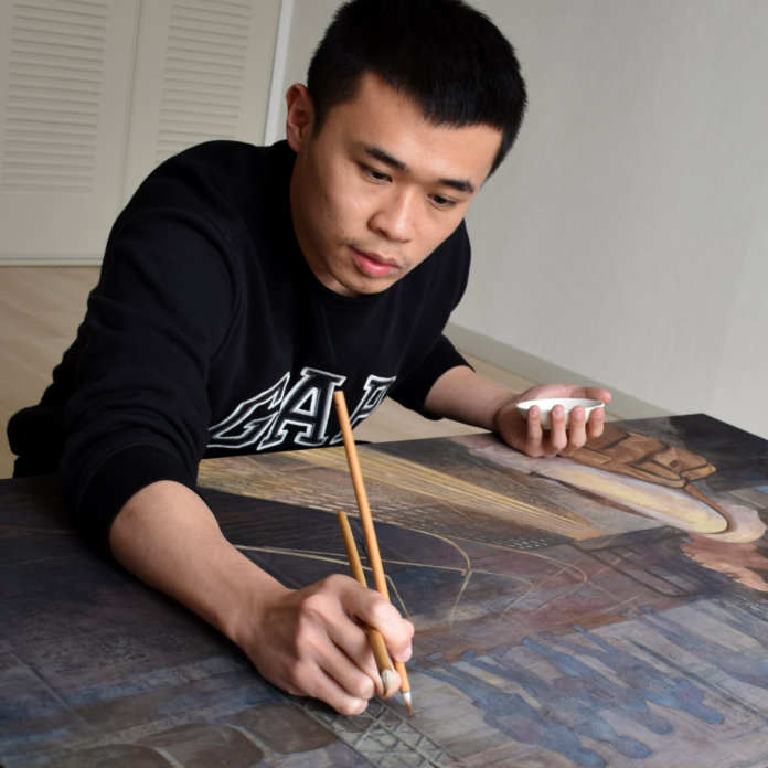 王冠賢創作時的樣子